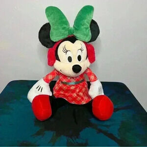 Disney Holiday Minnie Plush with green bow & red ear muffs.  16 1/2” high.